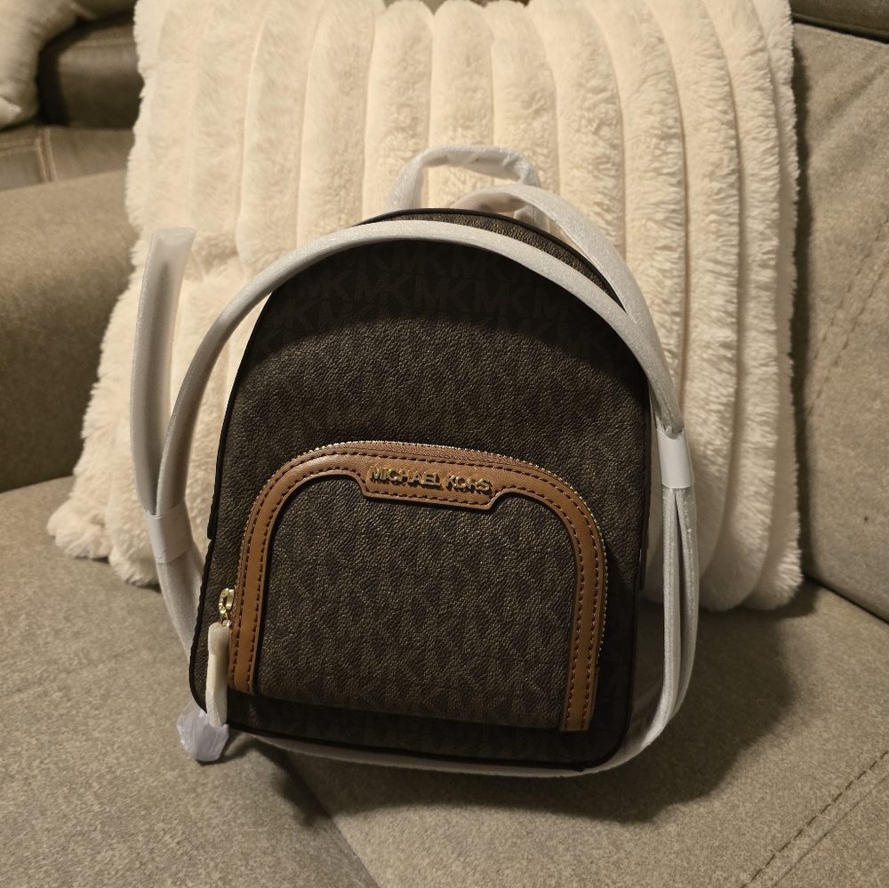 MK Back pack.  Two tone brown.  New with tags. Such a cute bag.
